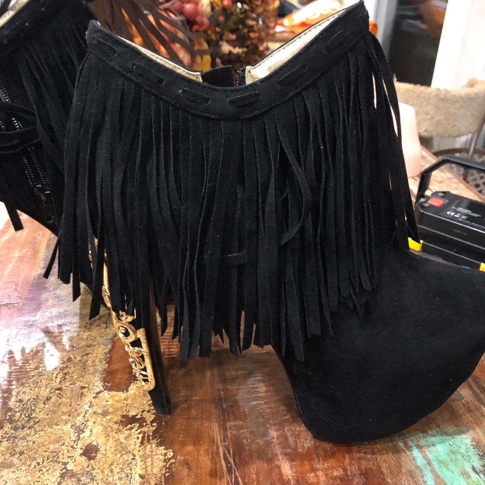 Black tassel platforms by  Privileged